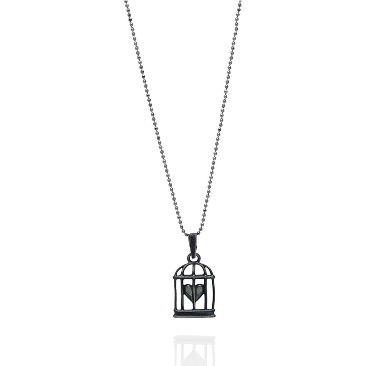 „Herz im Käfig“-Anhänger aus 925er Silber mit oxidierter Oberfläche – Talisman für Liebe und einen freien Geist, Amulett für Gefühle und innere Stärke, Skulpturenschmuck im Boho- und rustikalen Stil | Art Diva
