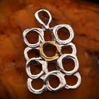 „Geometrische Kreise“ – Anhänger aus 925er Silber, Talisman für Harmonie, Bewegung und kreative Freiheit, Skulpturenschmuck im Boho- und rustikalen Stil | Art Diva