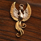 „Phönix“-Anhänger aus 925er Silber mit goldenen Akzenten – handpolierter Talisman für Wiedergeburt, Stärke und Neuanfang, skulpturaler Schmuck im Boho-Rustik-Stil | Art Diva