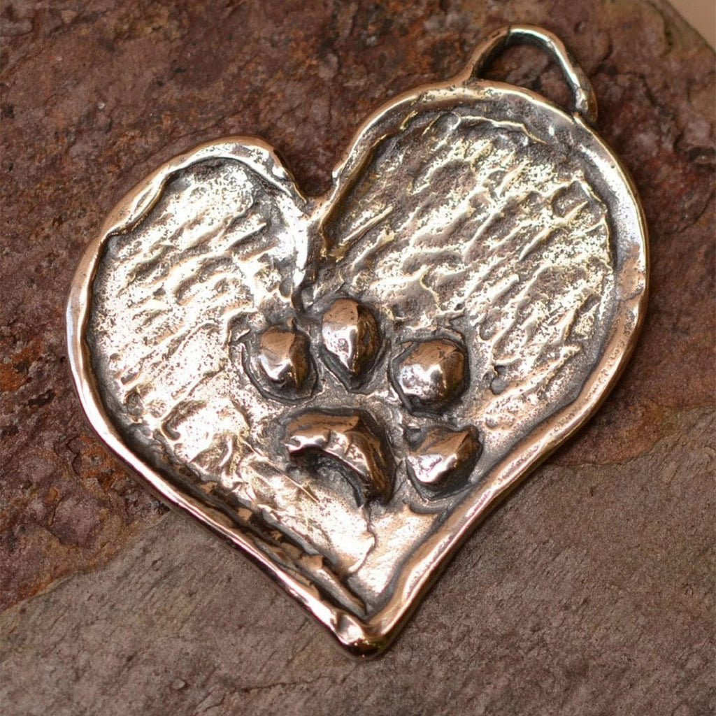 Herz-Anhänger mit Pfote aus 925er Silber – Talisman für Treue und Tierliebe, Schmuckstück im Boho- und rustikalen Stil für Hunde- und Katzenliebhaber | Art Diva