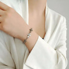 „Kreuze und Herzen“-Armband aus 925er Silber – Symbol für Liebe und Glauben, oxidierter skulpturaler Schmuck im Boho-Rustik-Stil | Art Diva